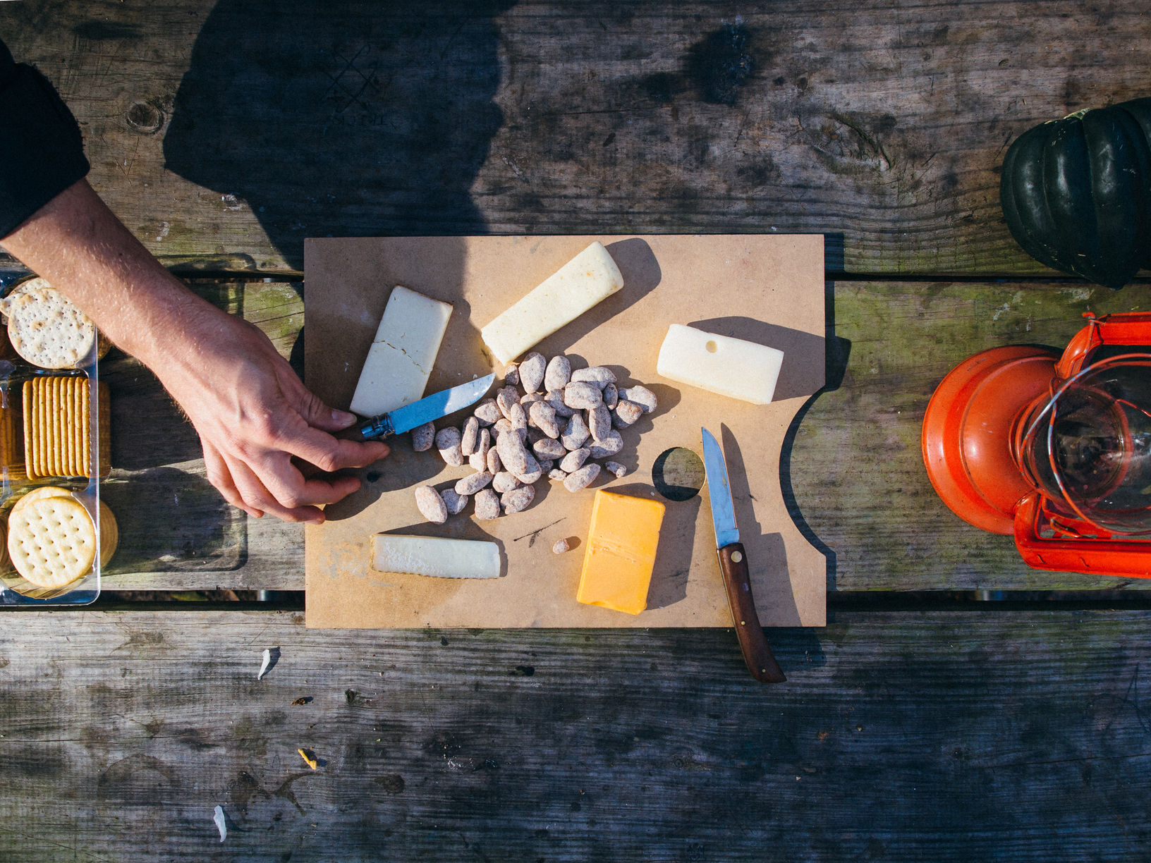 A top down view of a cheese platter at a campground