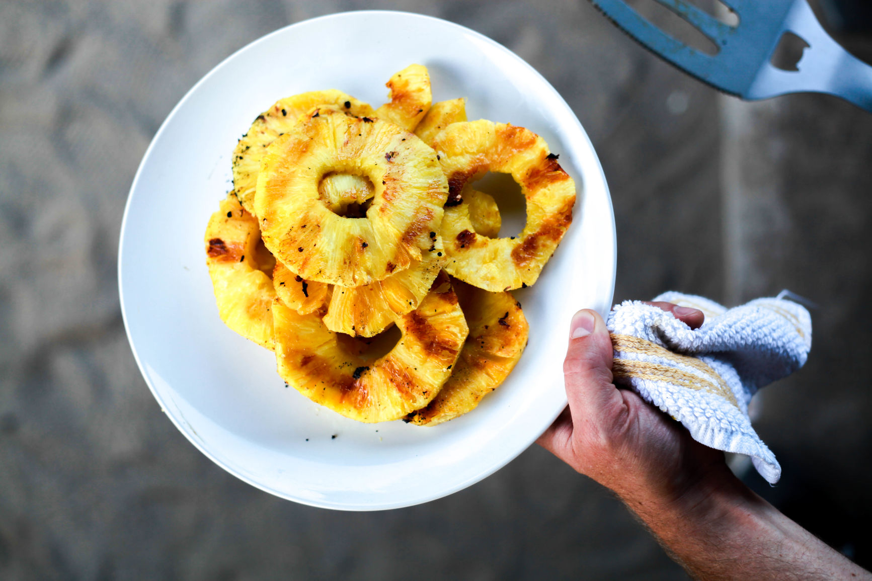 Looking down on a plate of grilled pineapple