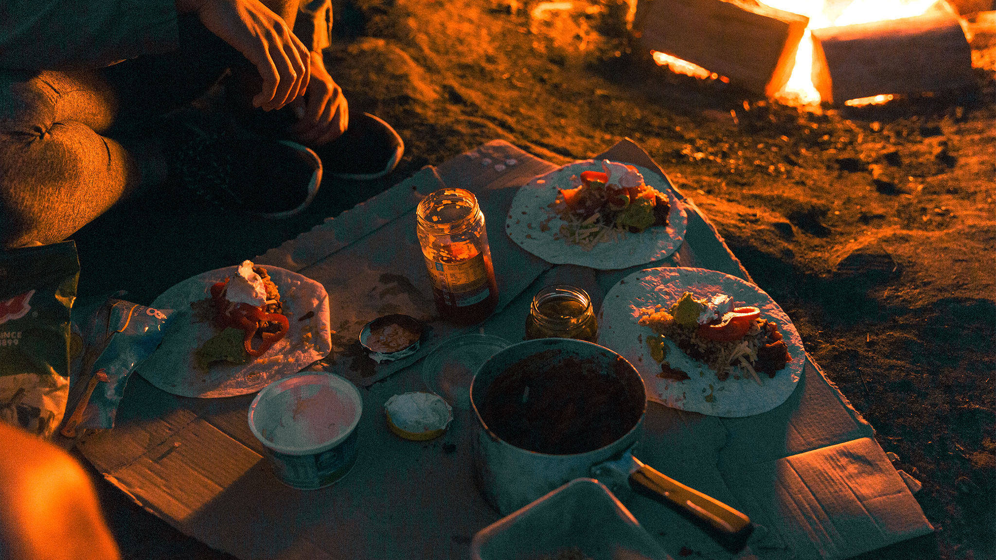 Dinner by a campfire in a NSW national park. Photo credit: Tim Clark / DPE