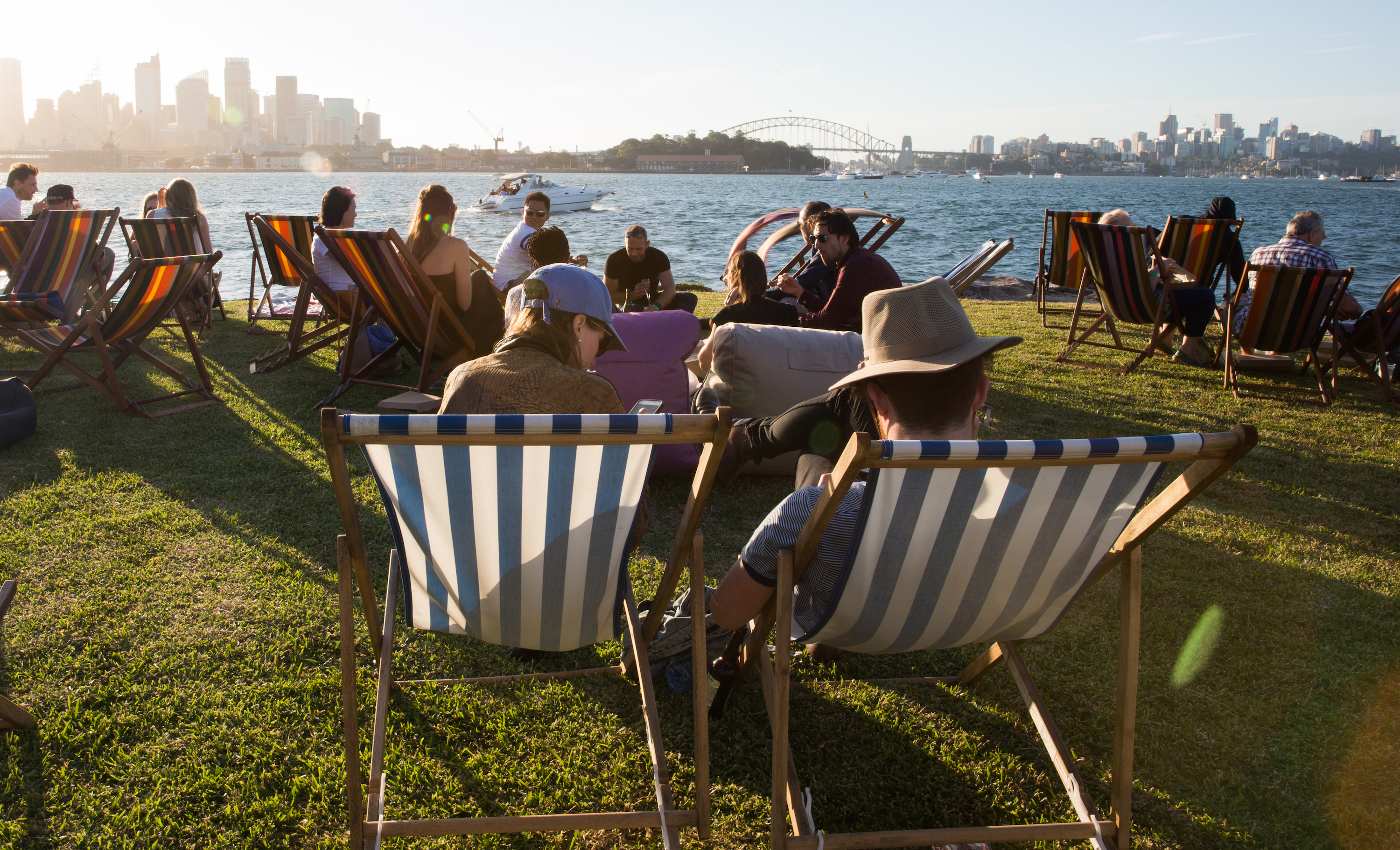People relaxing before the Sydney Harbour New Year's Eve fireworks at Clark Island, Sydney Harbour National Park. Photo: Edwina Pickles/DPIE
