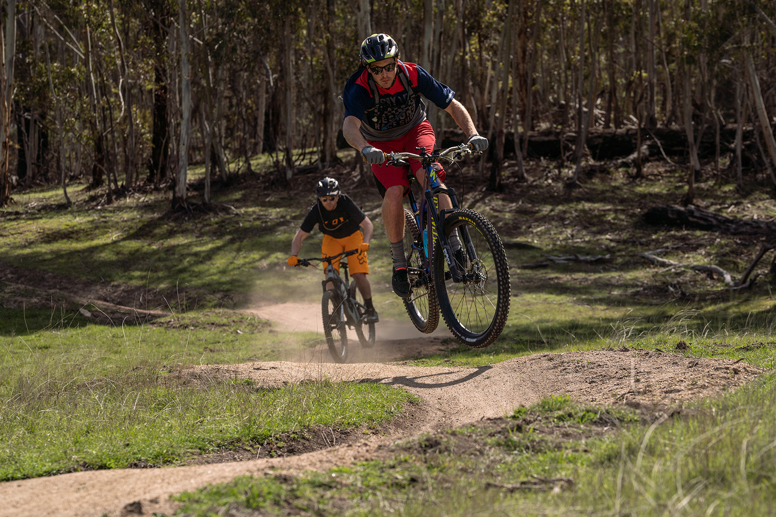 Two guys riding the lower Thredbo Valley track, Thredbo-Perisher area in Kosciuszko National Park. Photo credit: Rob Mulally/DPIE