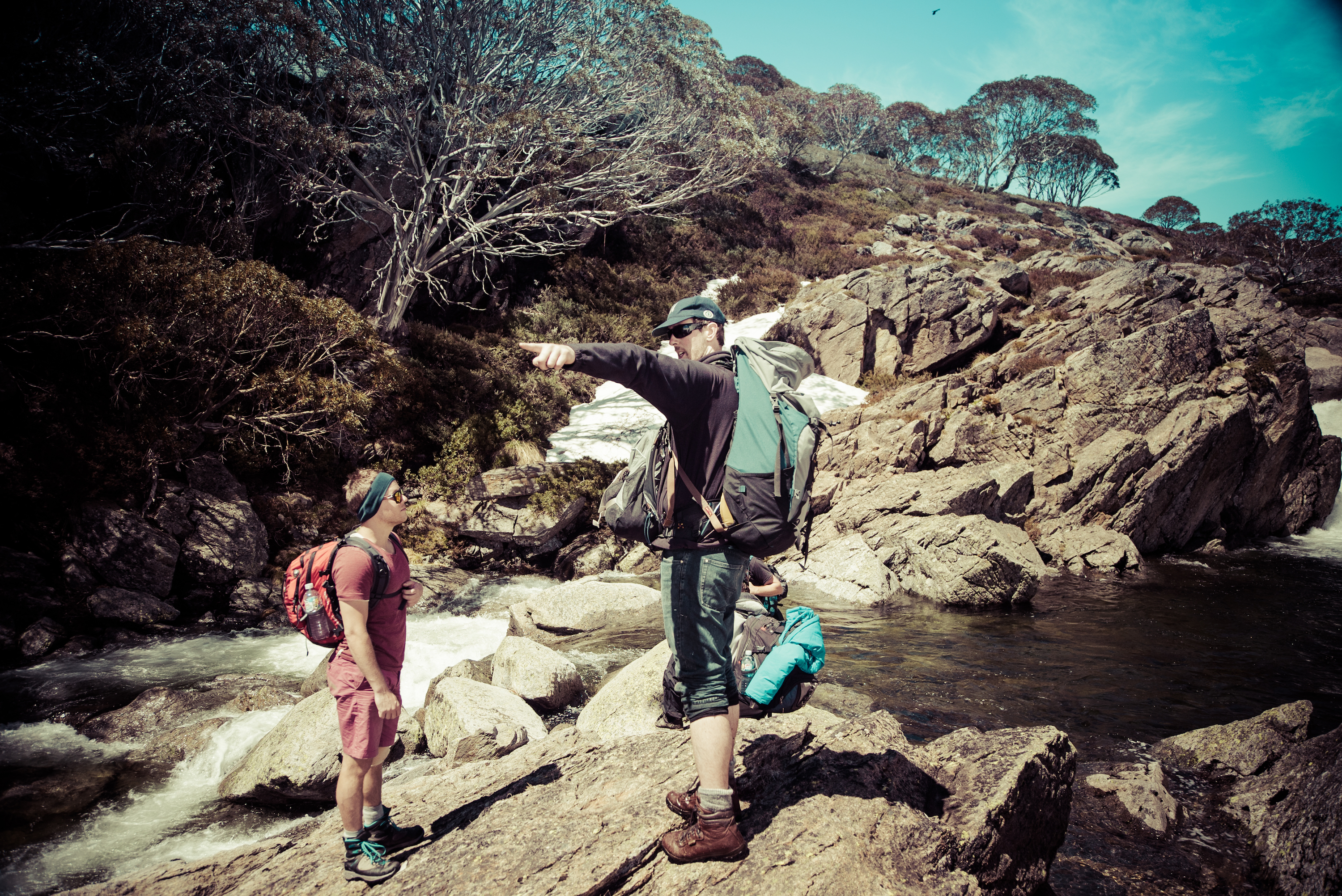 Hikers discussing directions, Kosciuszko National Park. Photo: Daniel Parsons/DPIE