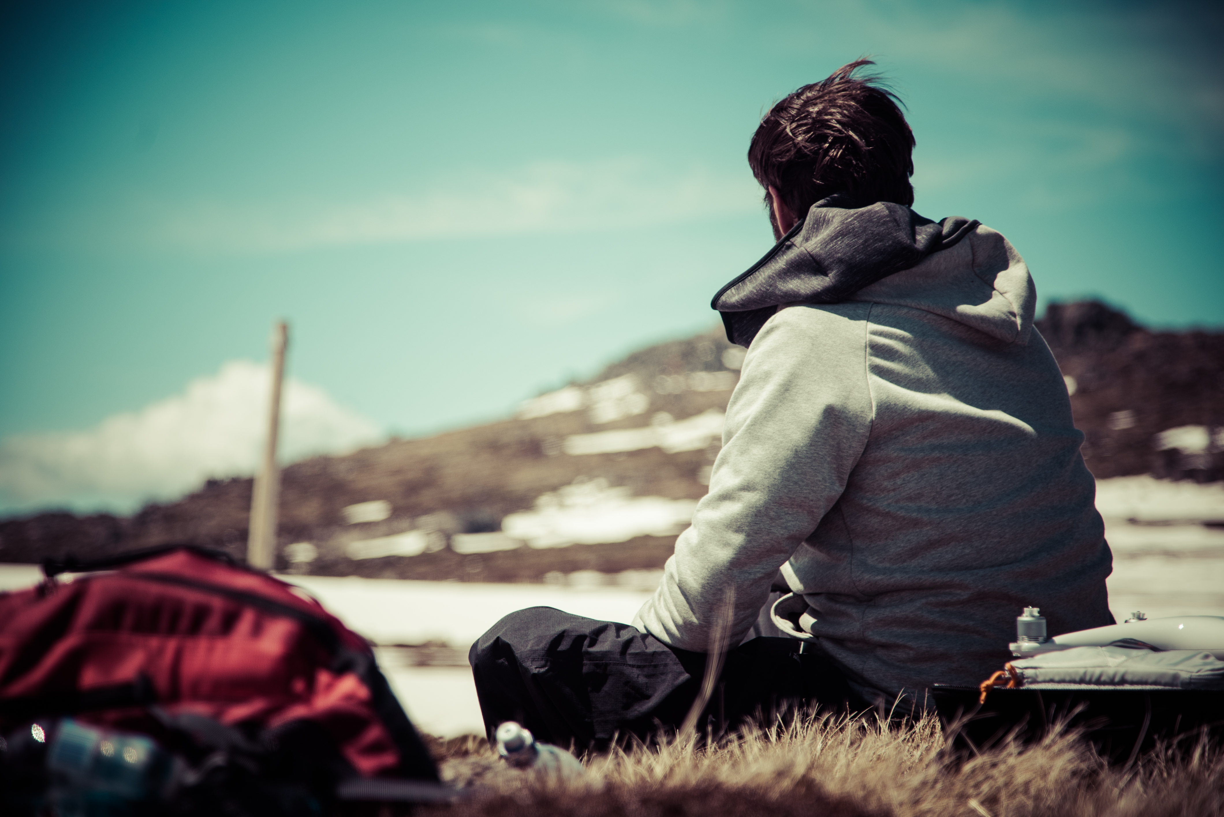 Person admiring view of Snowy Mountains, Kosciuszko National Park. Photo: Daniel Parsons/DPIE