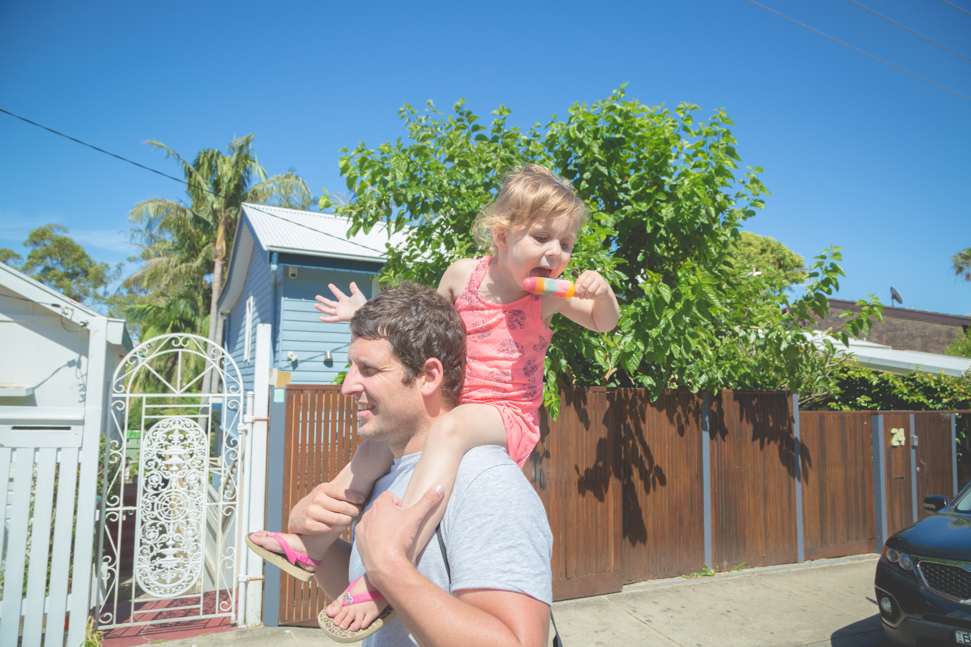 Father and daughter walking through Watsons Bay. Photo: © Instagram - @hugh.obrien