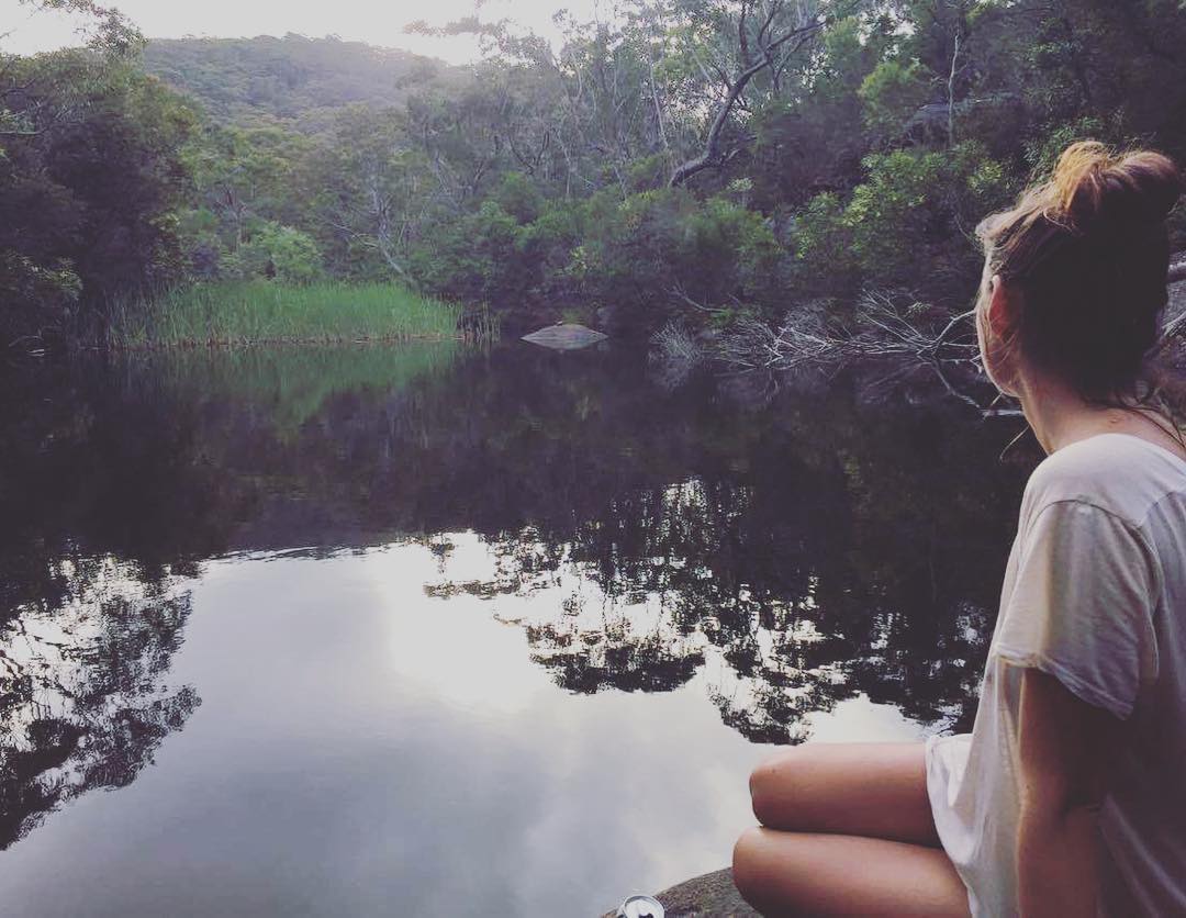 Person overlooking a water hole in a NSW national park. Photo: © Instagram @johannachnilsson