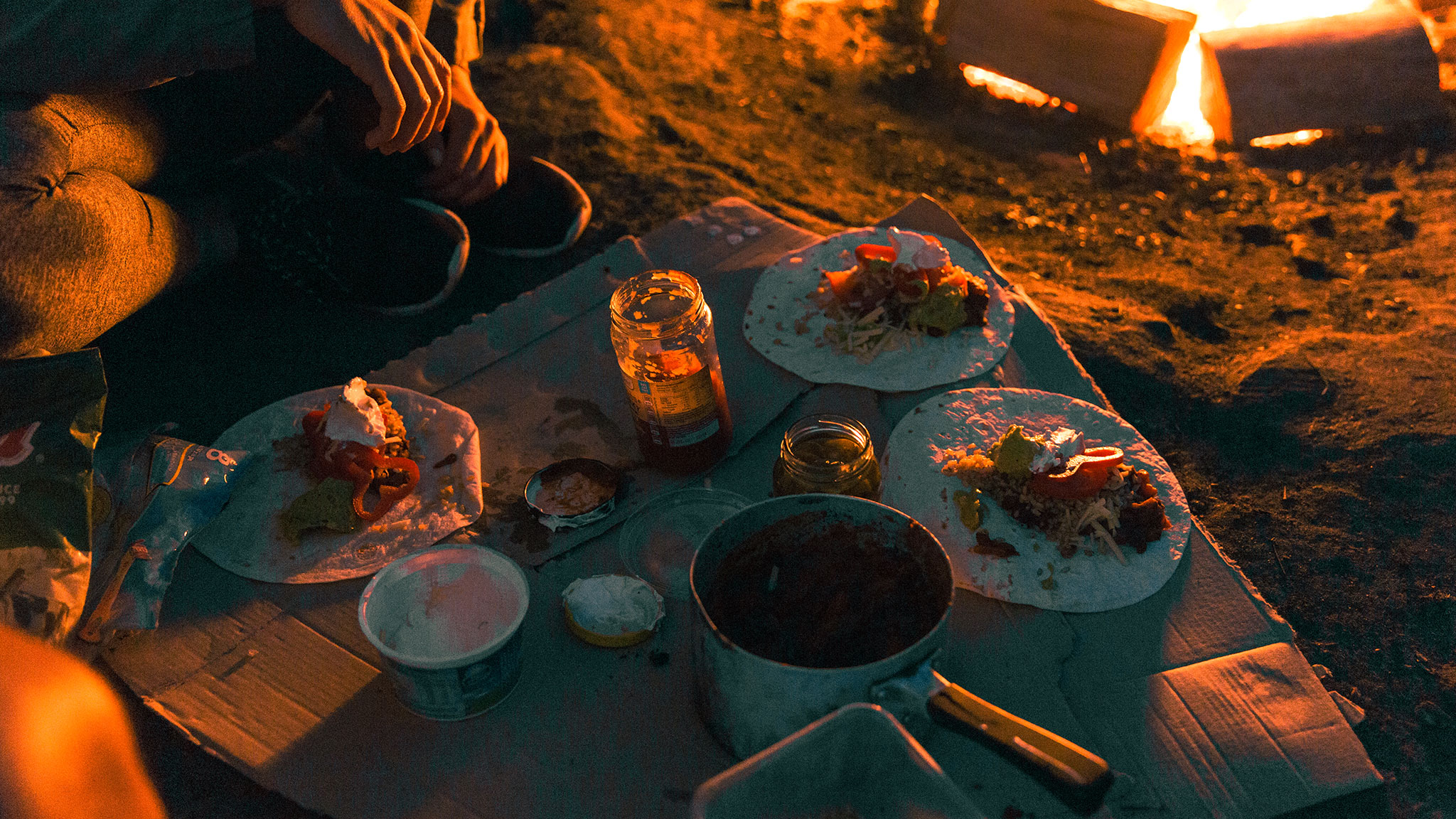 Dinner by a campfire in a NSW national park. Photo credit: Tim Clark / DPE