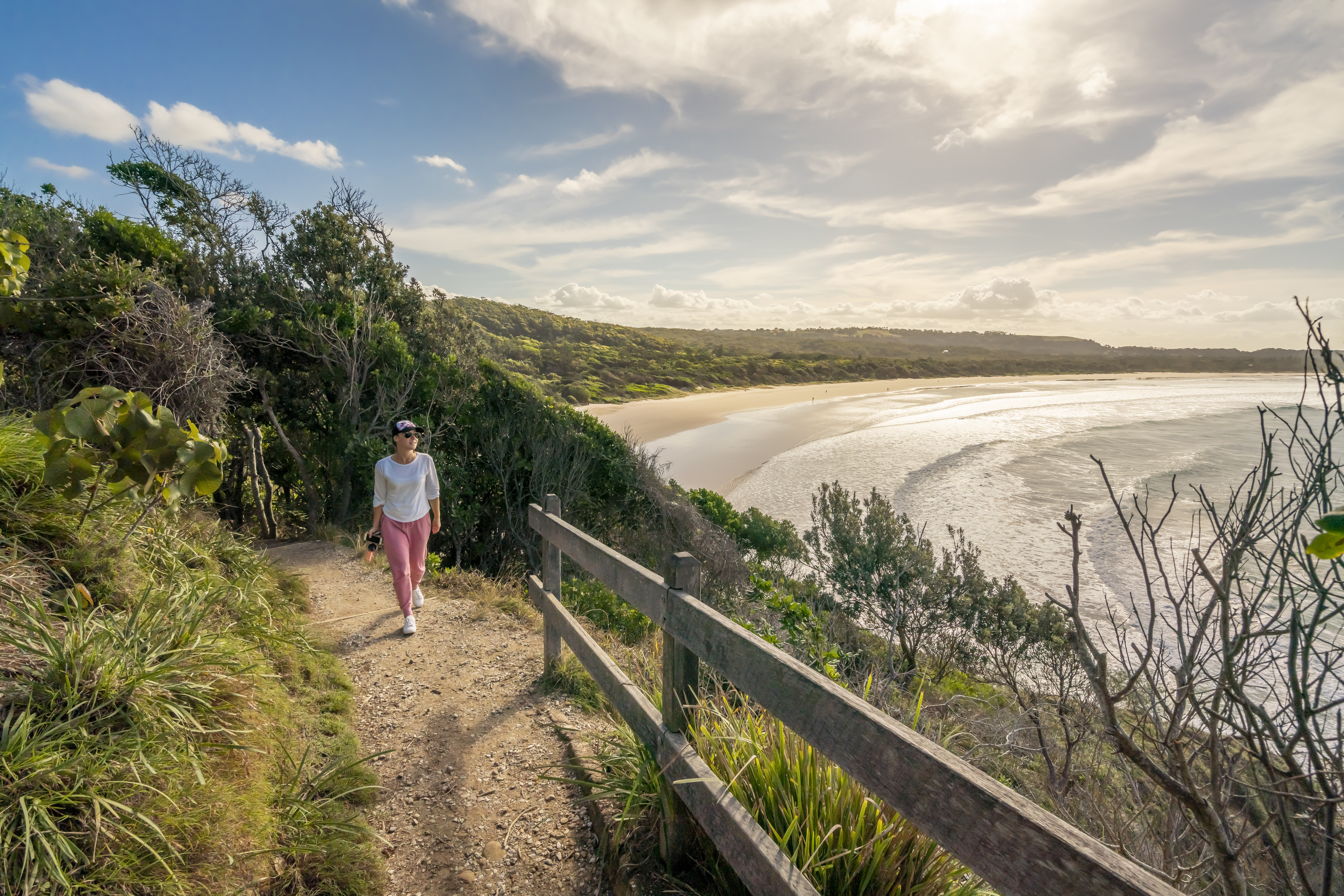 Person walking on the Three Sisters walking track, Broken Head Nature Reserve. Photo credit : John Spencer / DPE