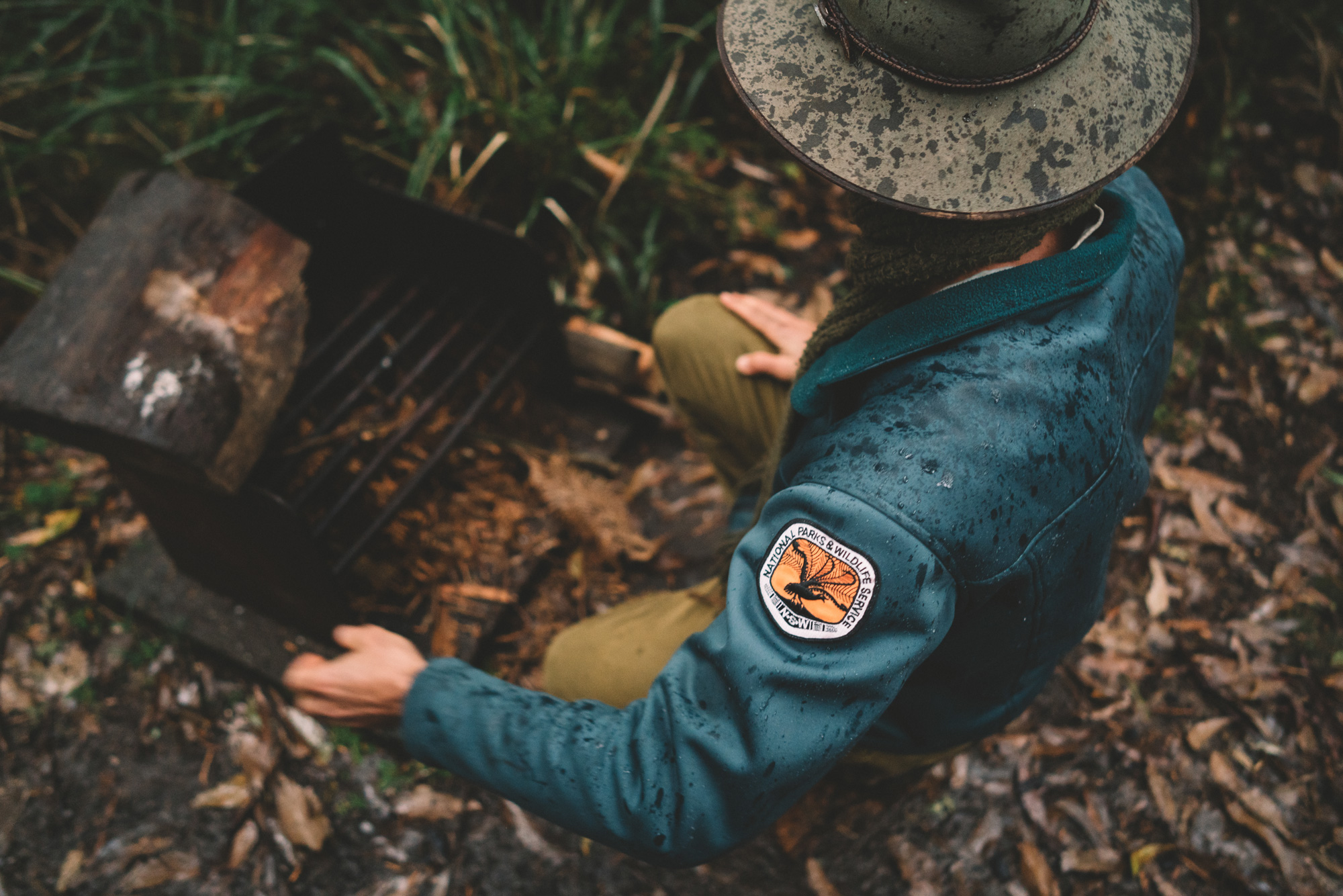 NPWS field officer in light rain. Photo credit: Branden Bodman/DPIE