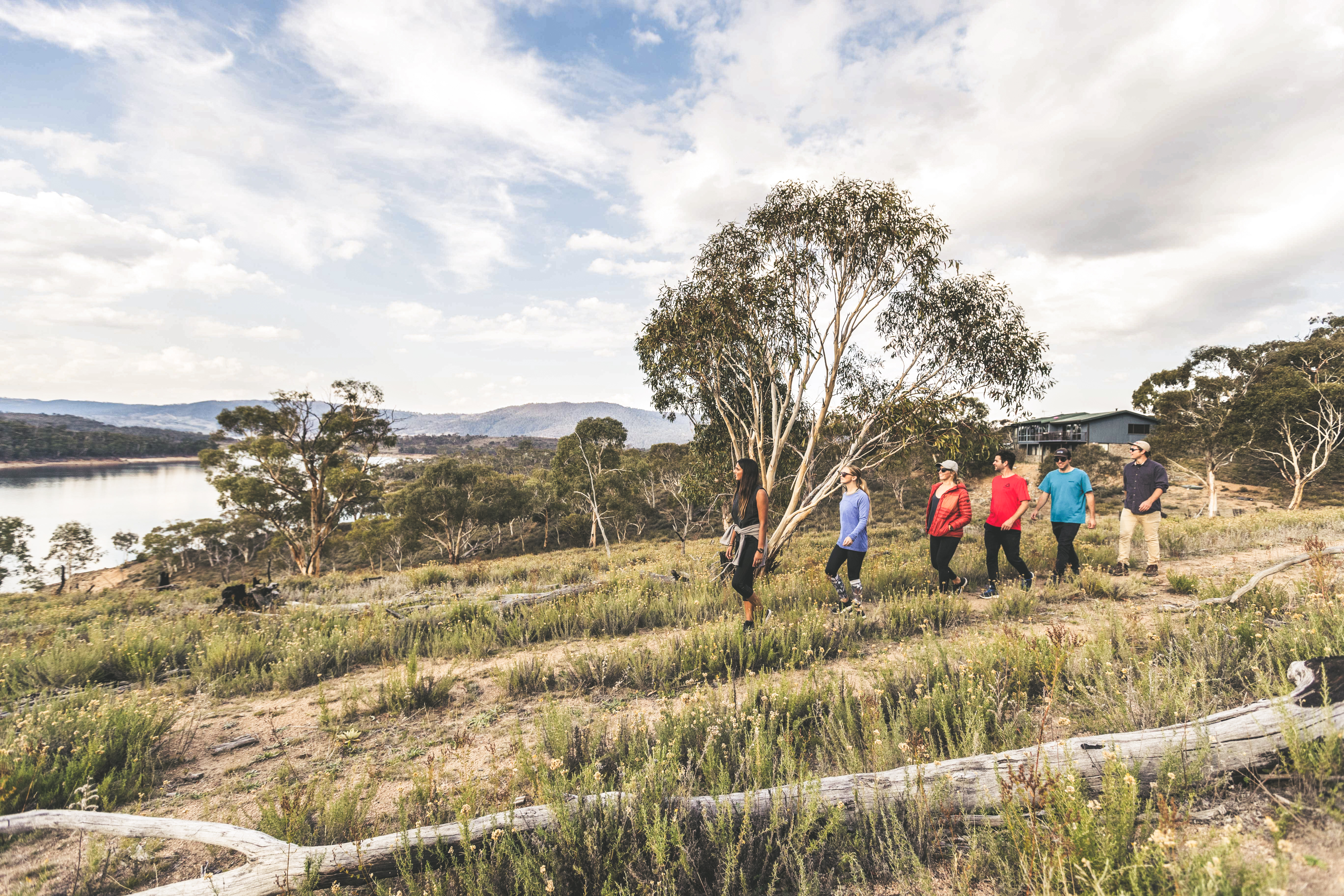 Group of people walking through Kosciuszko National Park. Photo credit: Boen Ferguson/DPIE