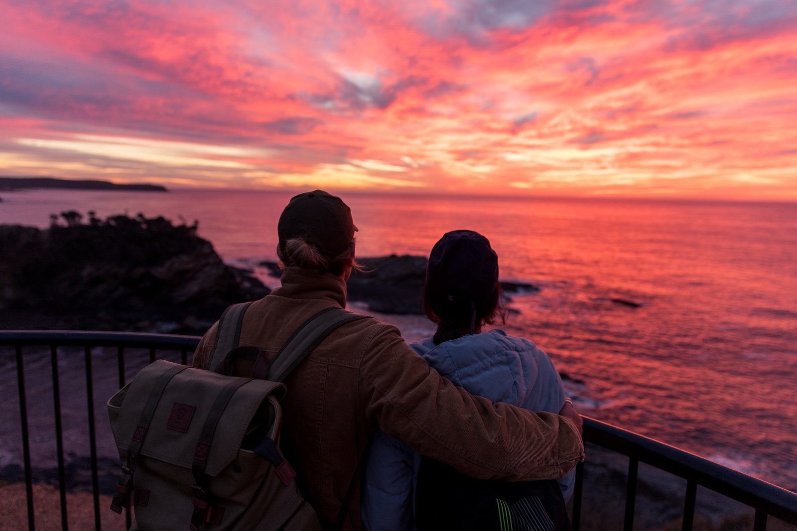 A woman and man at North Head lookout in Murramarang National Park. Photo credit: Melissa Findley/DPIE