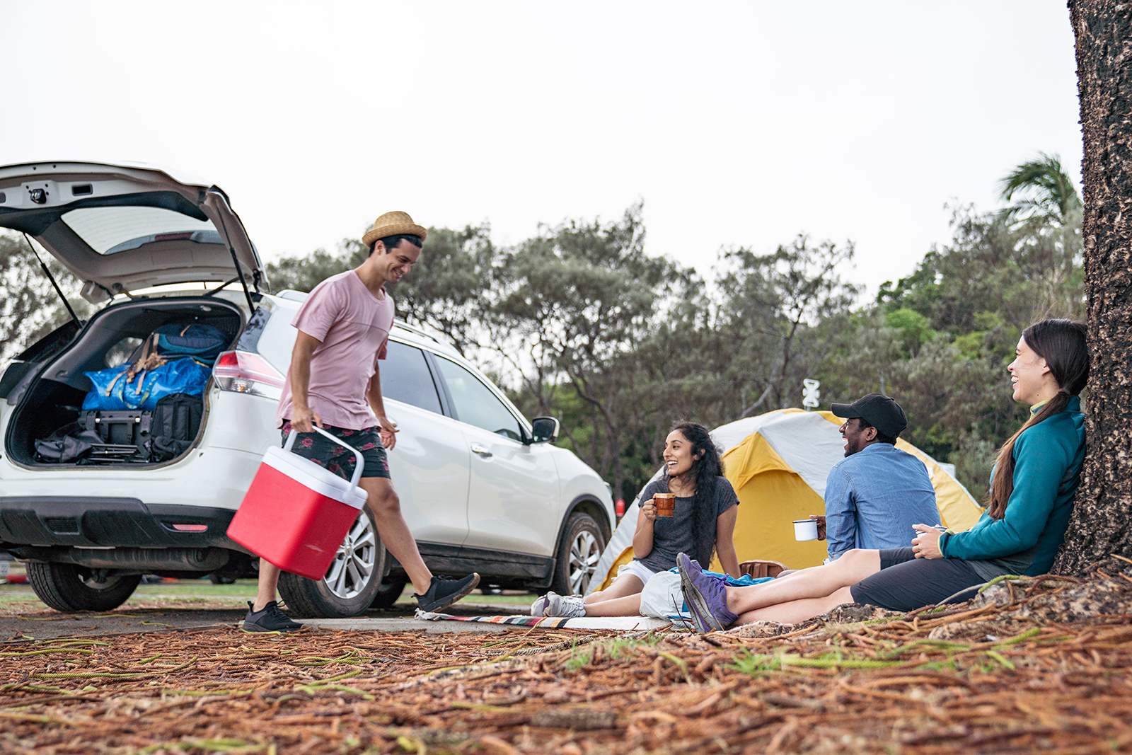 People enjoying and relaxing with a hot drink, Arakoon National Park. Photo credit: Rob Mulally/DPIE