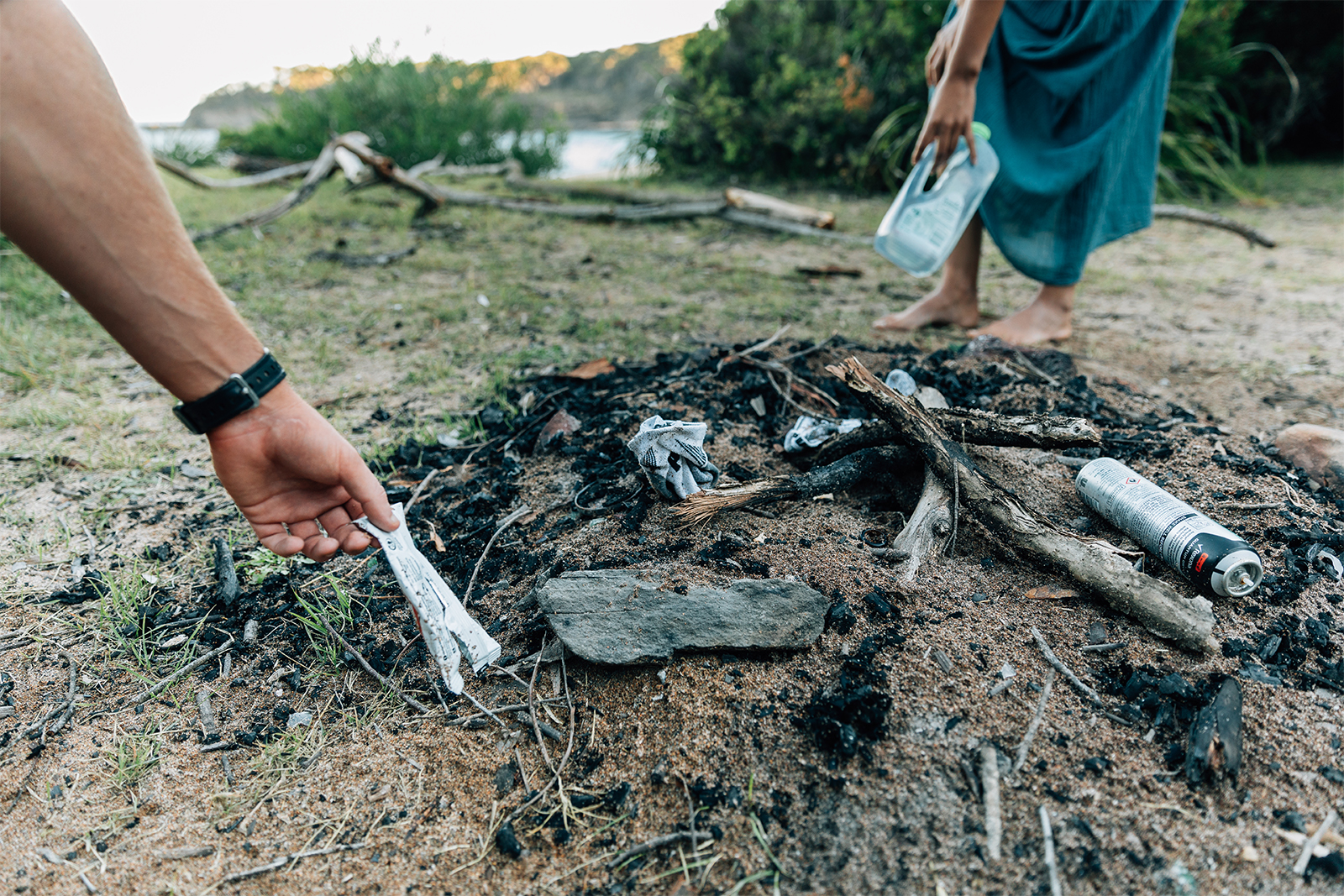 Two people picking up rubbish. Photo credit: Melissa Findley/DPIE