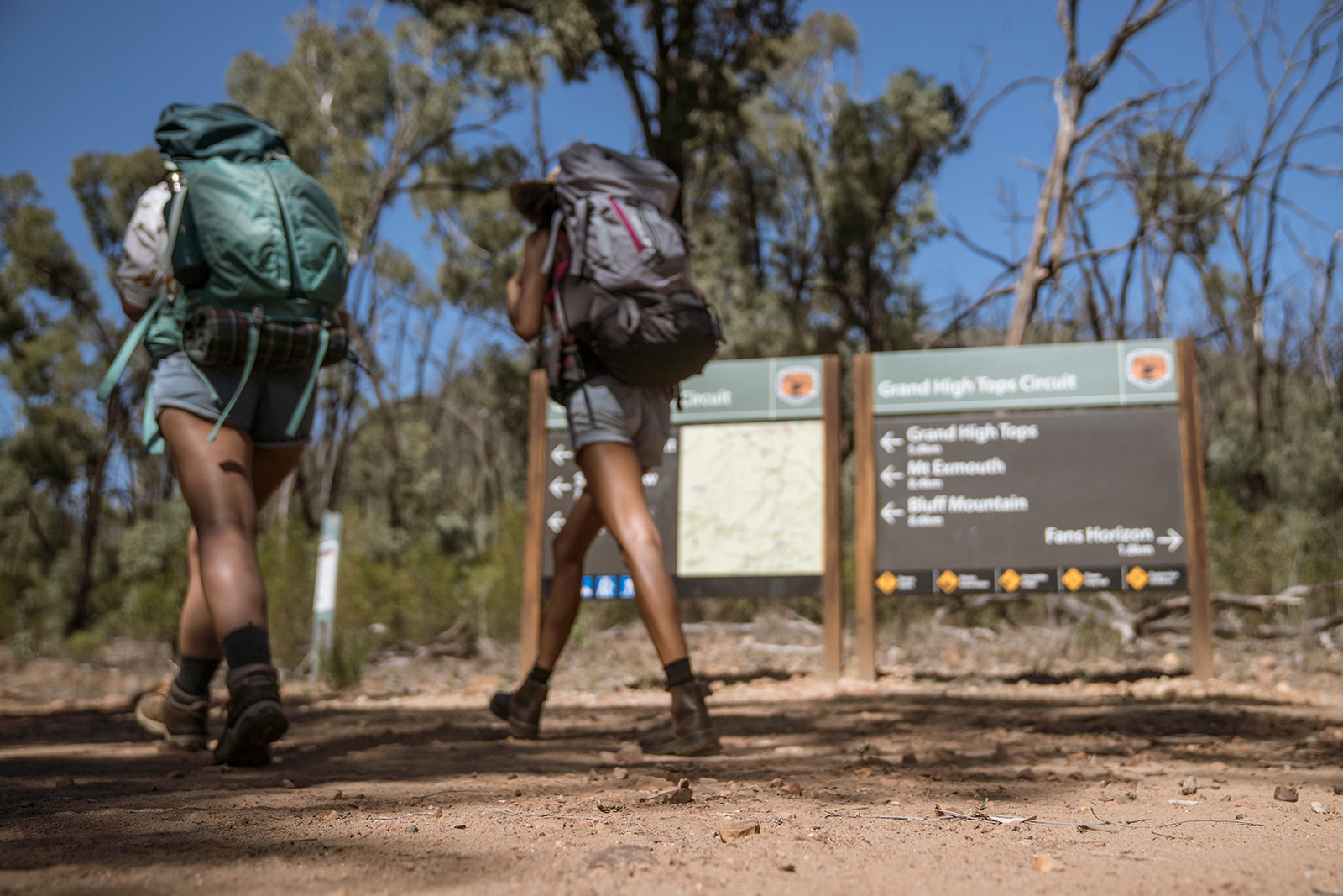Two people hiking in Warrumbungle National Park. Photo credit: Rob Mulally/DPIE