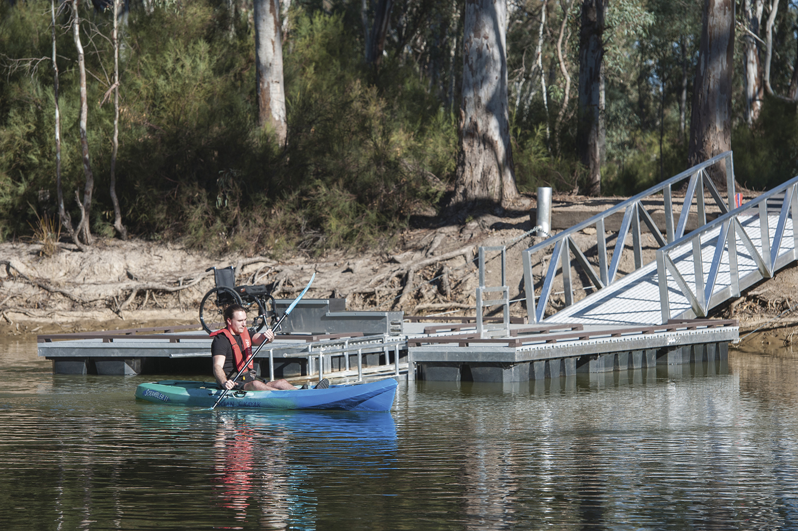 A man kayaking from the Edward River Bridge kayak launch. Photo credit: Rhys Leslie/DPIE