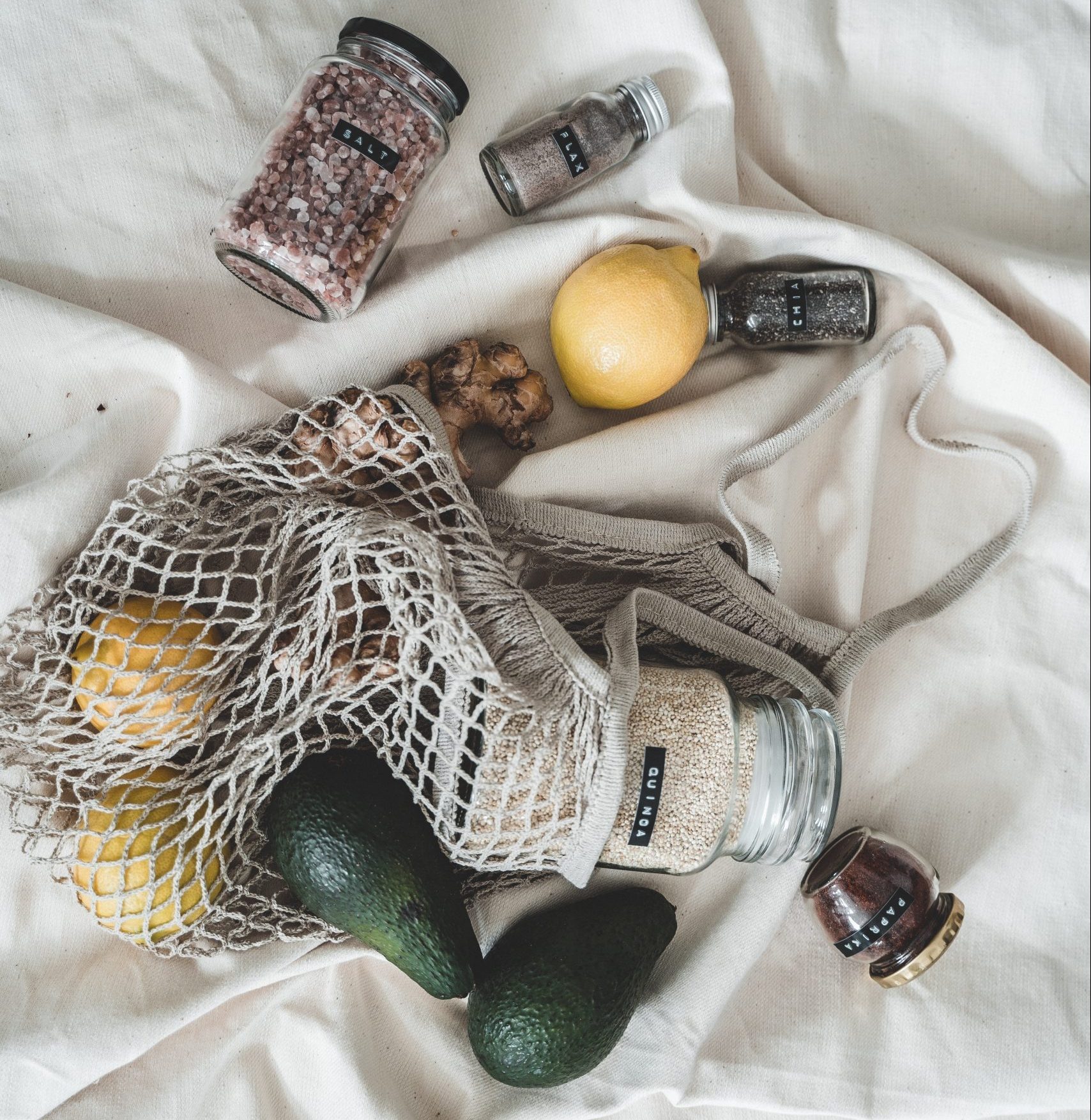 Flat lay of supermarket purchases in a eco net bag. Photo: Taryn Elliot via pexels