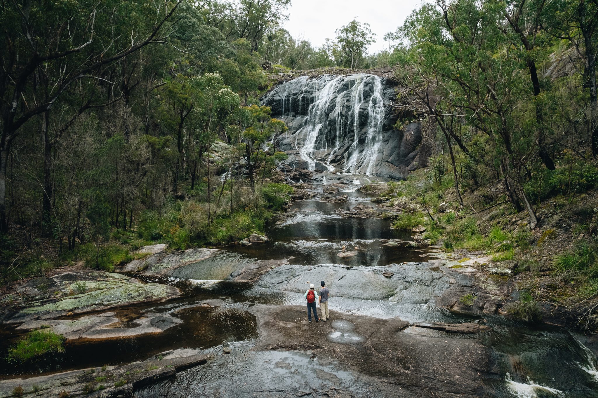 Standing beneath Basket Swamp Falls. Photo credit: Harrison Candlin / DPE