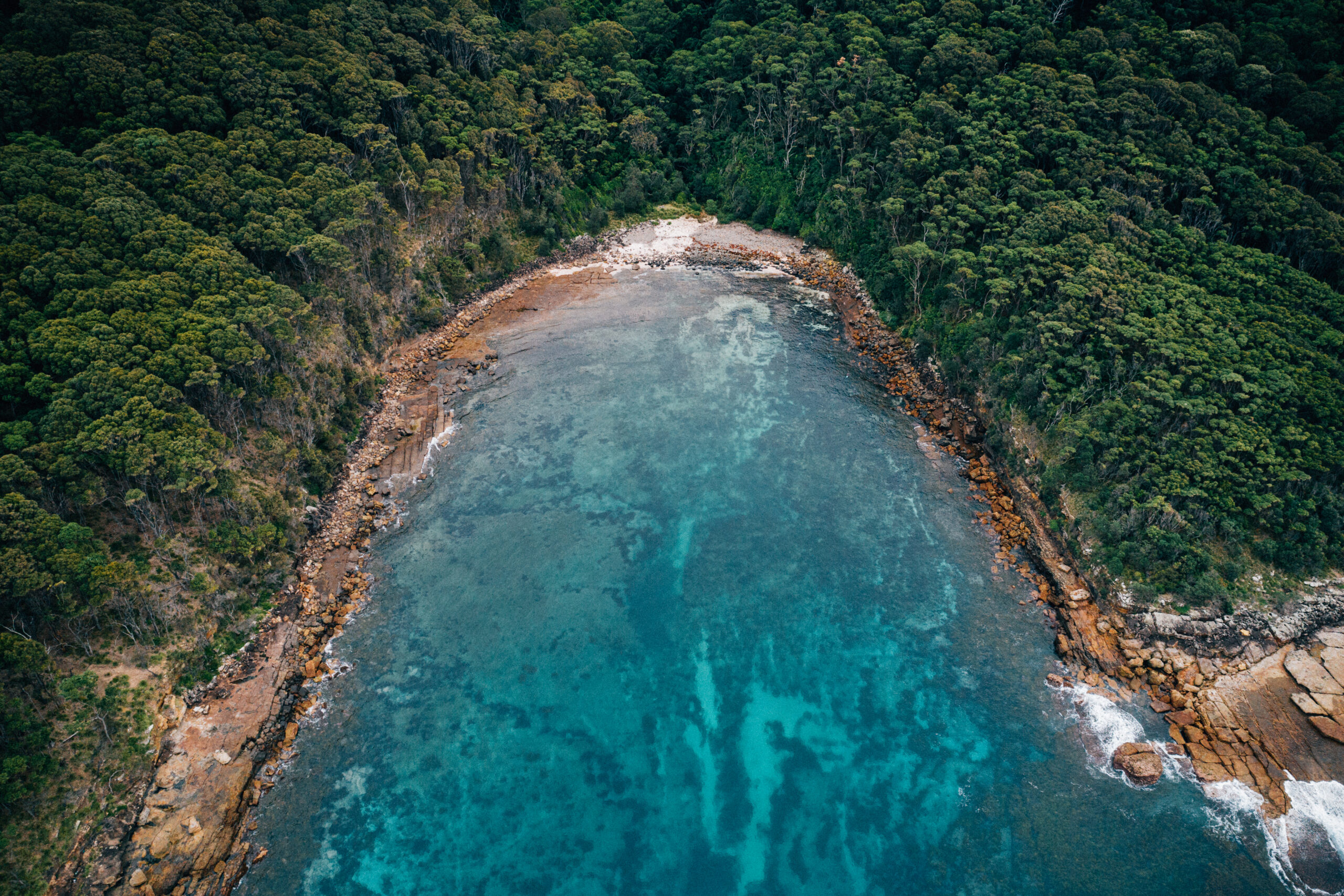 Aerial of a bay on the Murramarang South Coast walk. Murramarang National park Photo credit: Melissa Findley / DPE