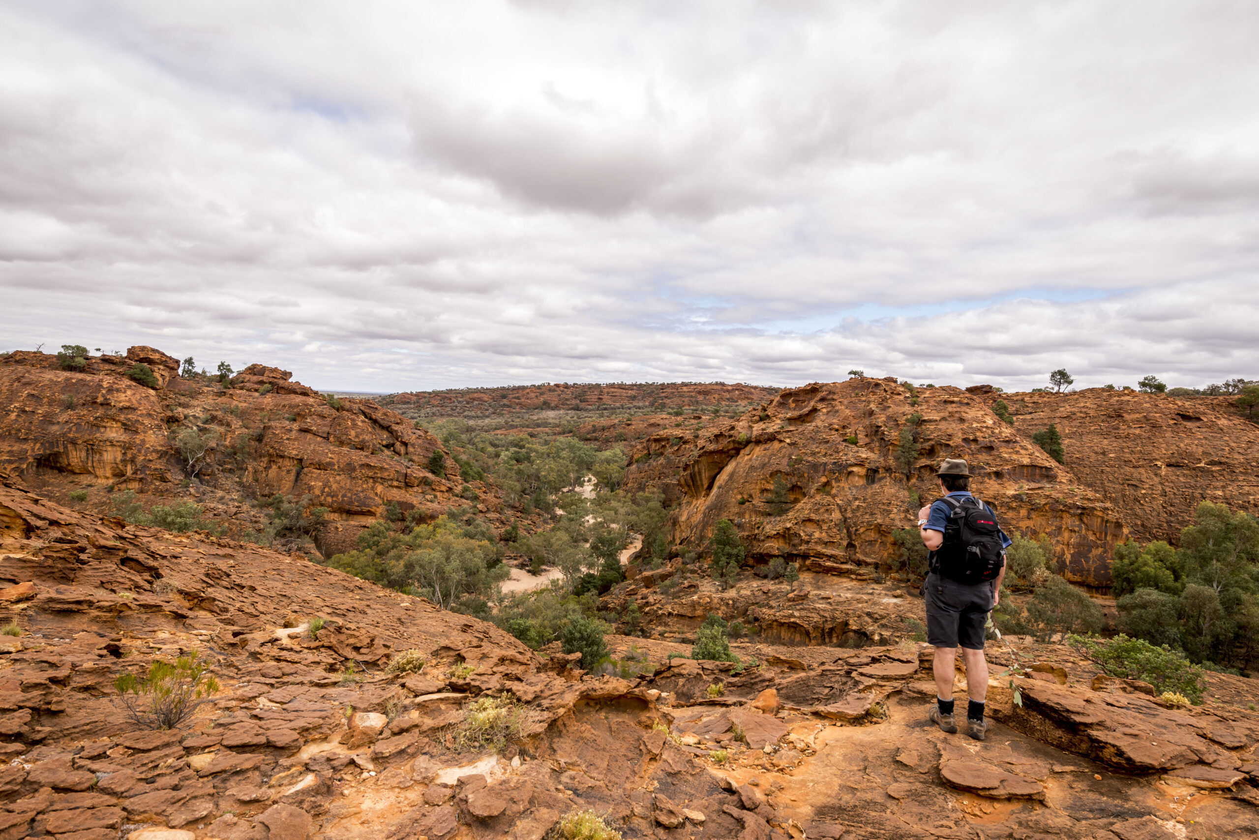 Bushwalker on the Rock Holes Loop Walking Track Mutawintji National Park. Photo credit: John Spencer / DPE