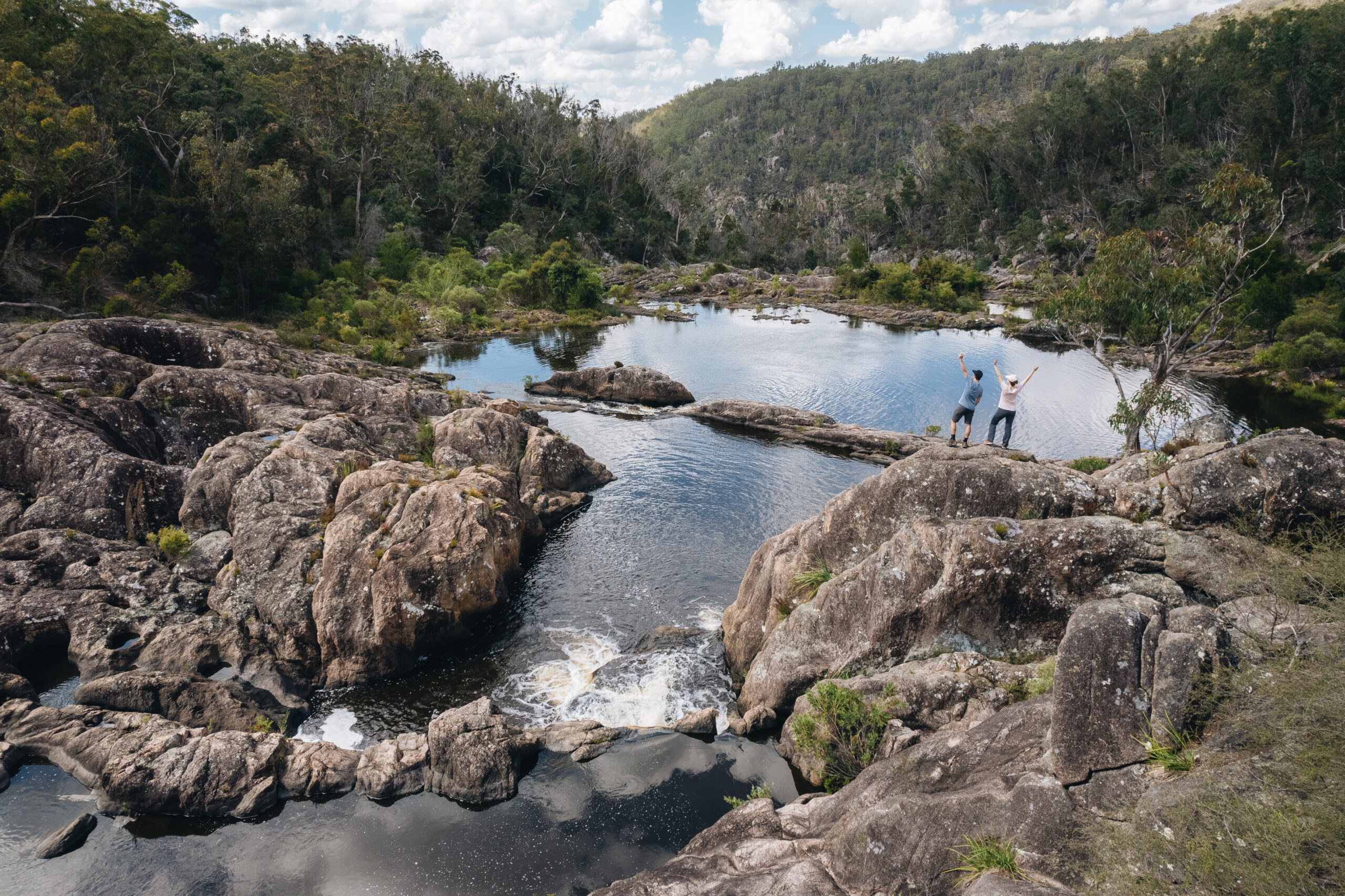 Couple at Boonoo Boonoo Falls rockpools. Photo credit: Harrison Candlin / DPE
