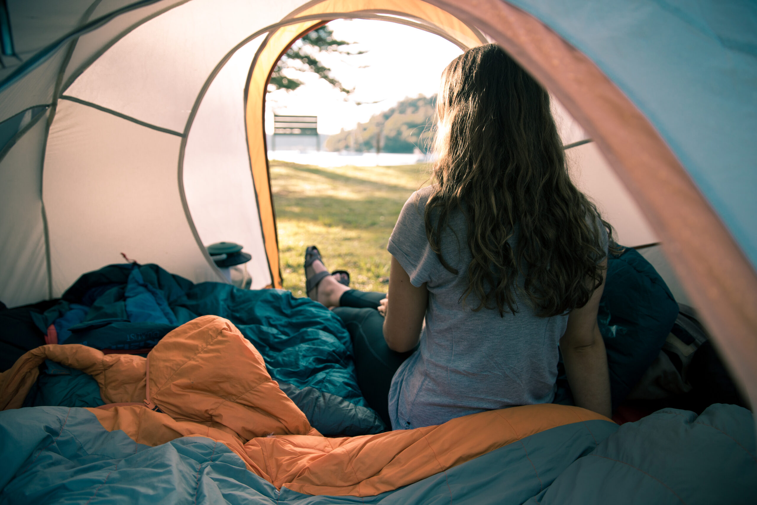 Woman in tent. Photo credit: Tim Clark / DPE