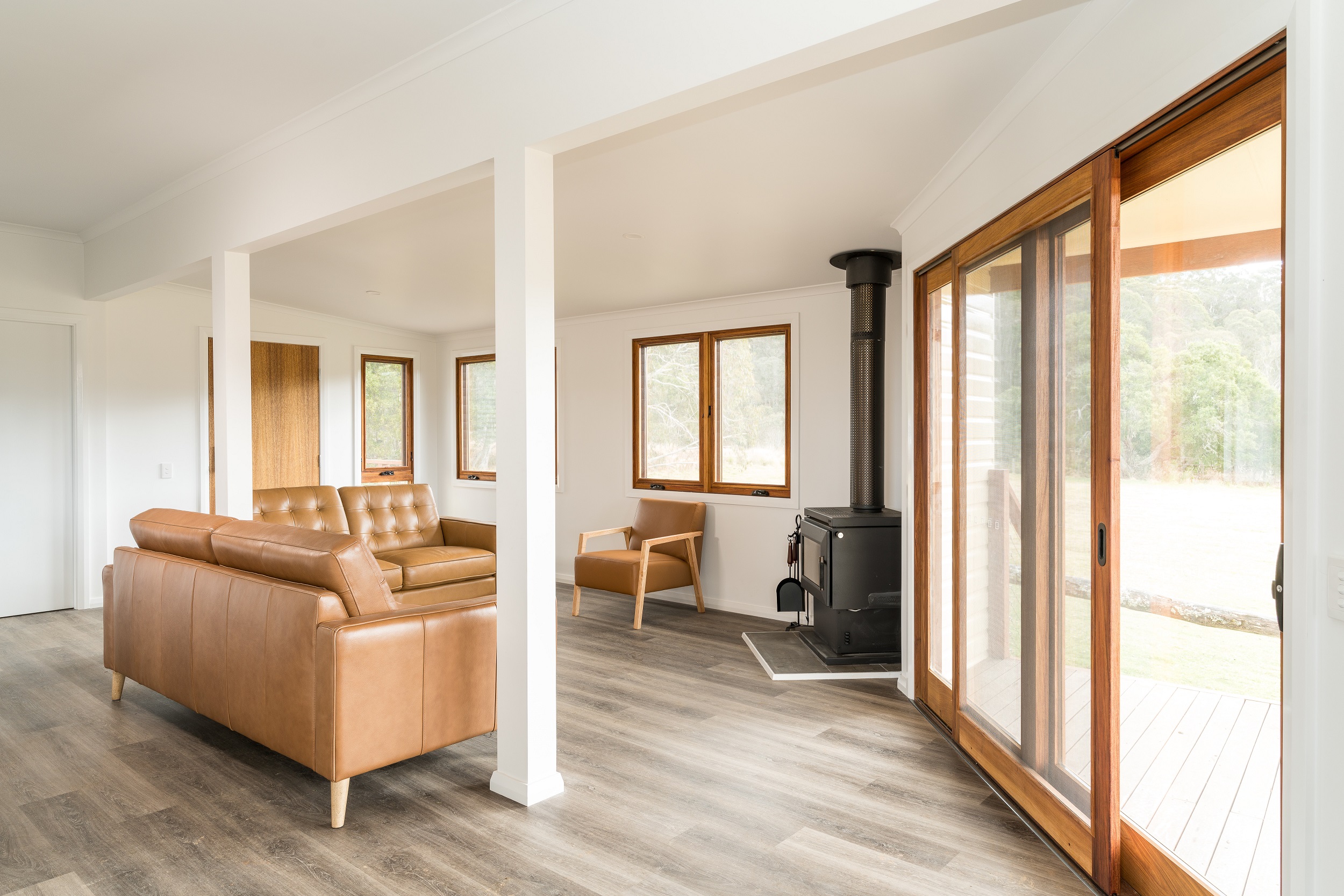 The lounge room inside Mooraback Cabin. Photo credit: David Waugh/DCCEEW