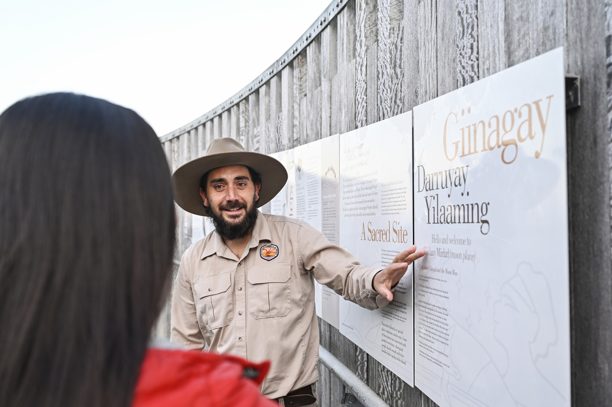 An Aboriginal Discovery Ranger gives a tour on Mutton Bird Island. Photo credit: Adam Hollingworth/DCCEEW © DCCEEW 