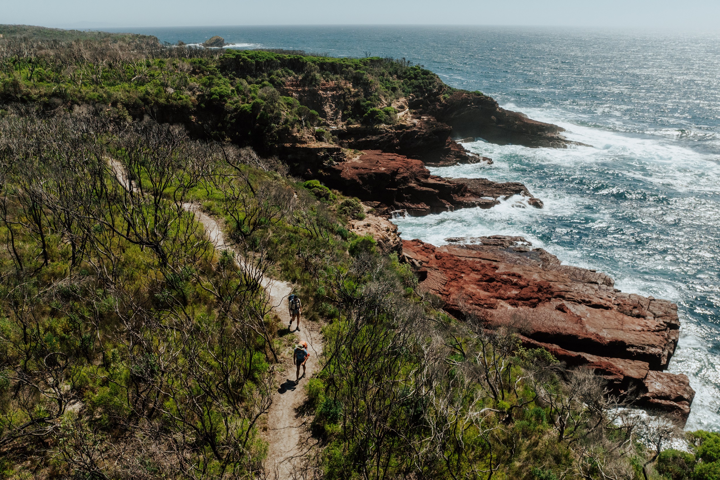 Two walkers on the Light to Light walk. Photo credit: Daniel Parsons/DCCEEW © Studio Bilby