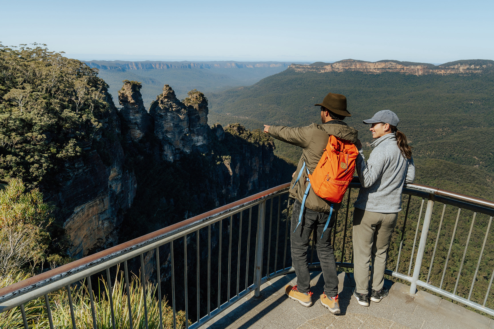 Two people at Echo Point lookout, Blue Mountains National Park. Photo: Remy Brand / DCCEEW © Studio Bilby