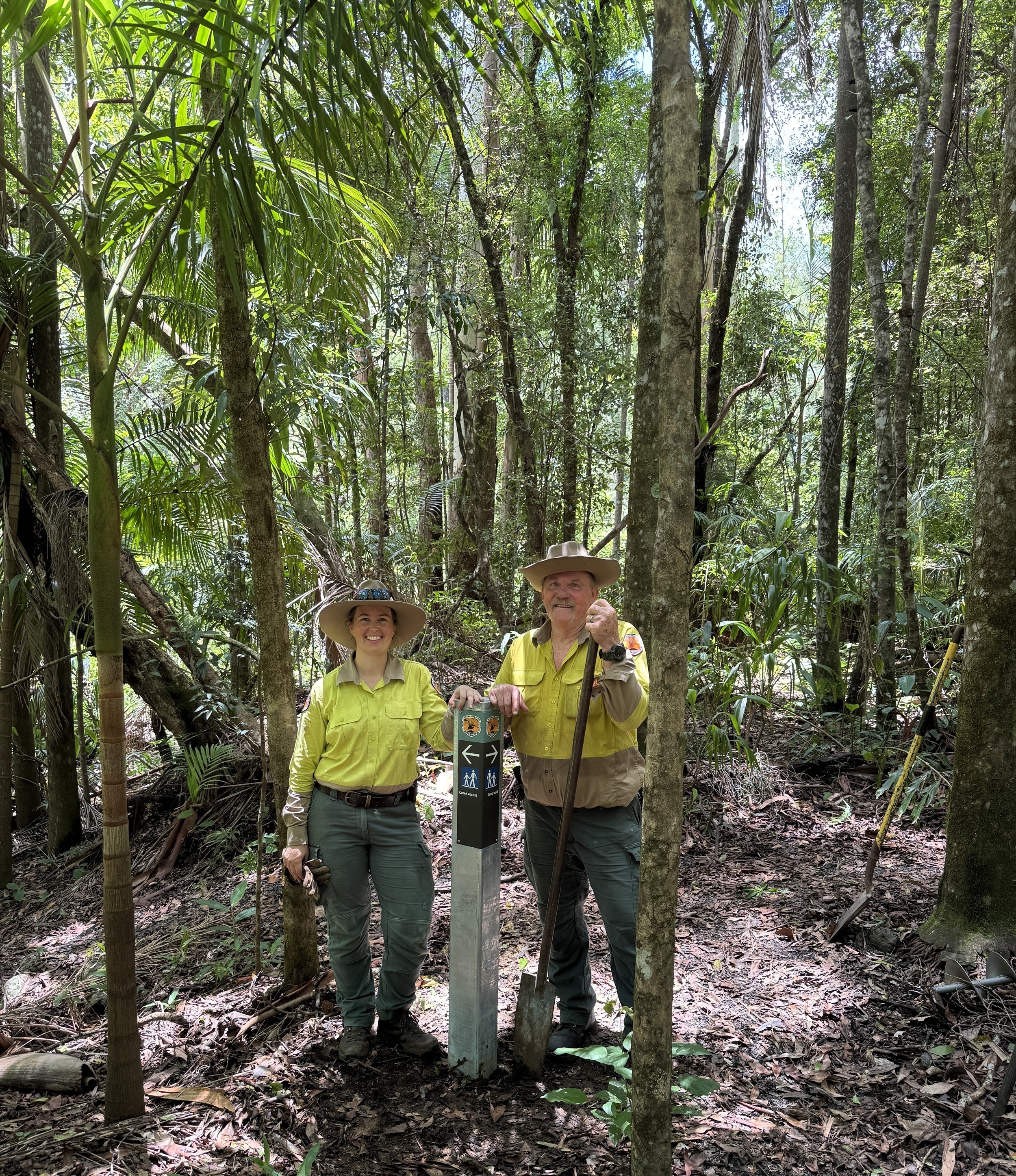 NPWS rangers putting signs in at Toonumbar National Park. Photo: © Amanda Dudgeon