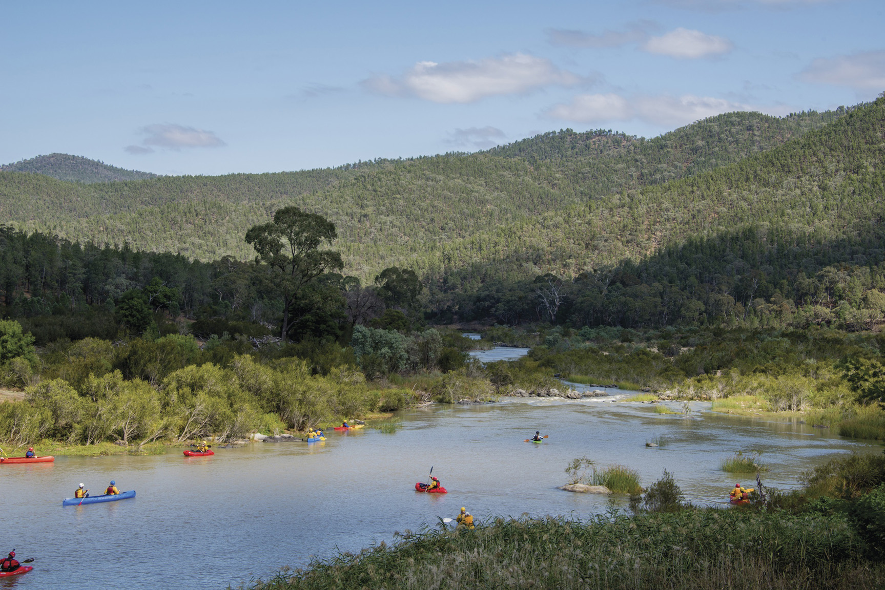 People kayaking in Kosciuszko National Park. Photo: John Spencer/DCCEEW © DCCEEW