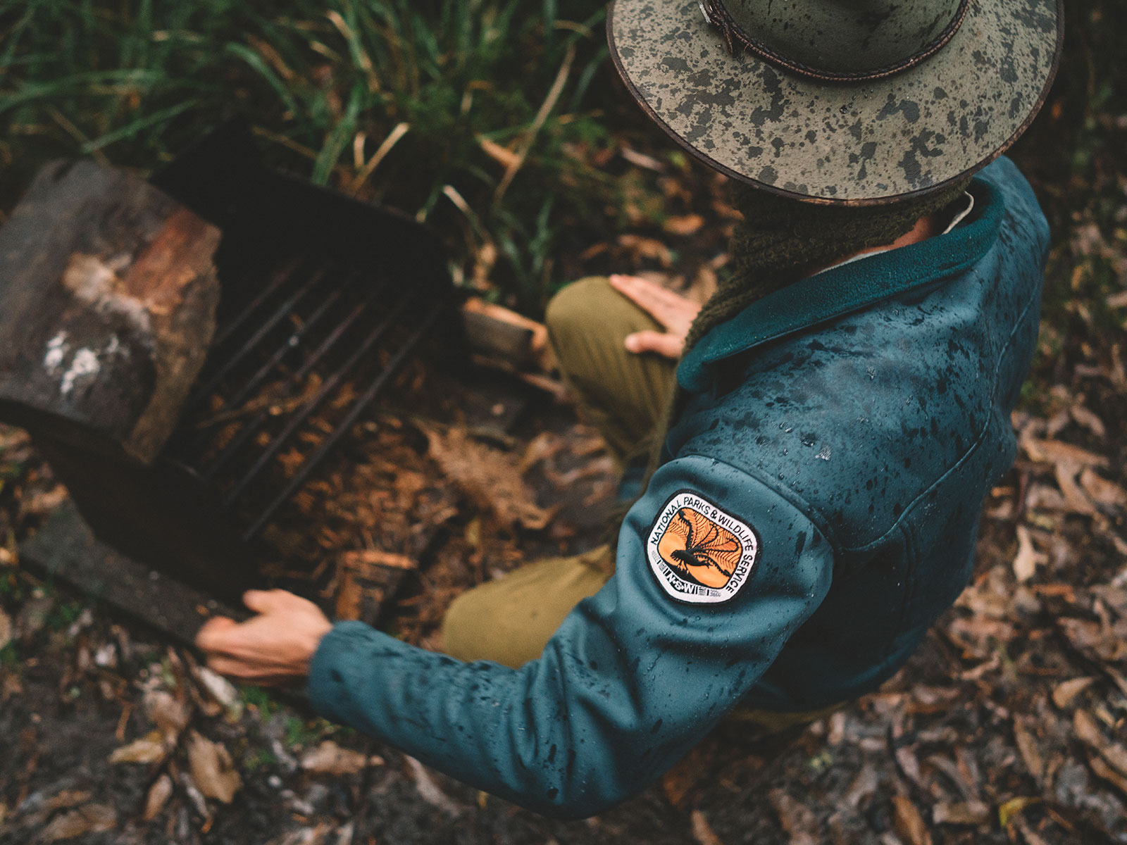 NPWS field officer in light rain. Photo credit: Branden Bodman/DCCEEW © Branden Bodman