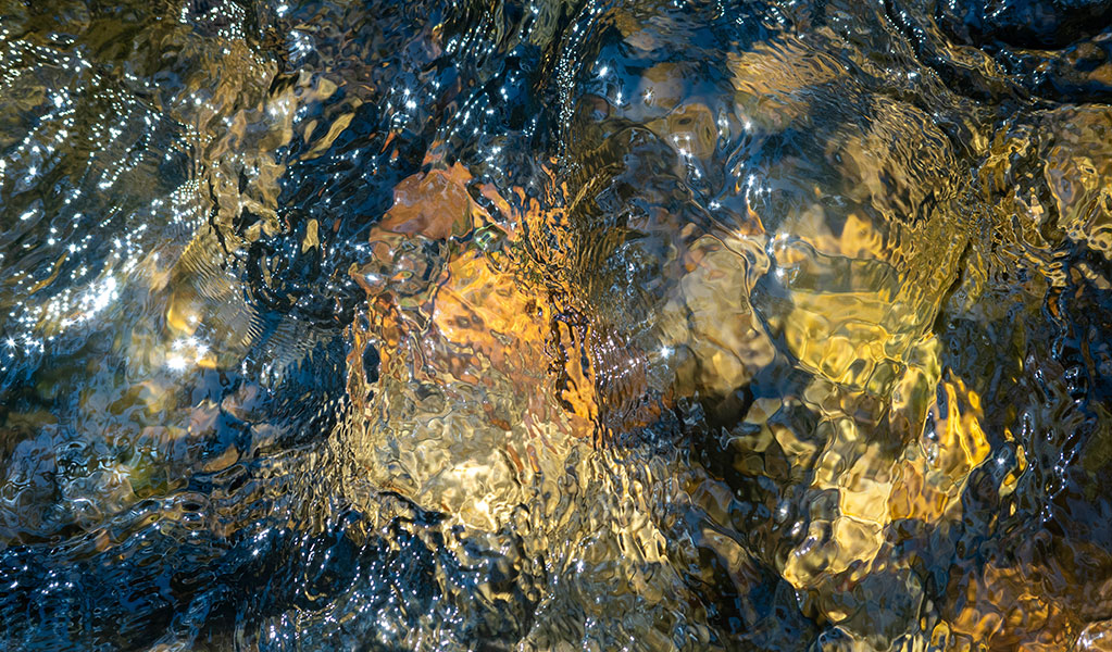 An artist's photograph of moving water, from the art exhibition at Blue Mountains Heritage Centre. Credit: Gemma Deavin &copy; DCCEEW and Blue Mountains Heritage Centre