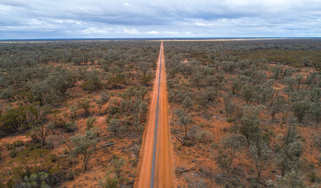 Feral predator-proof fence stretching to the horizon, Mallee Cliffs National Park. Credit: Brad Leue/Australian Wildlife Conservancy &copy; the photographer/AWC