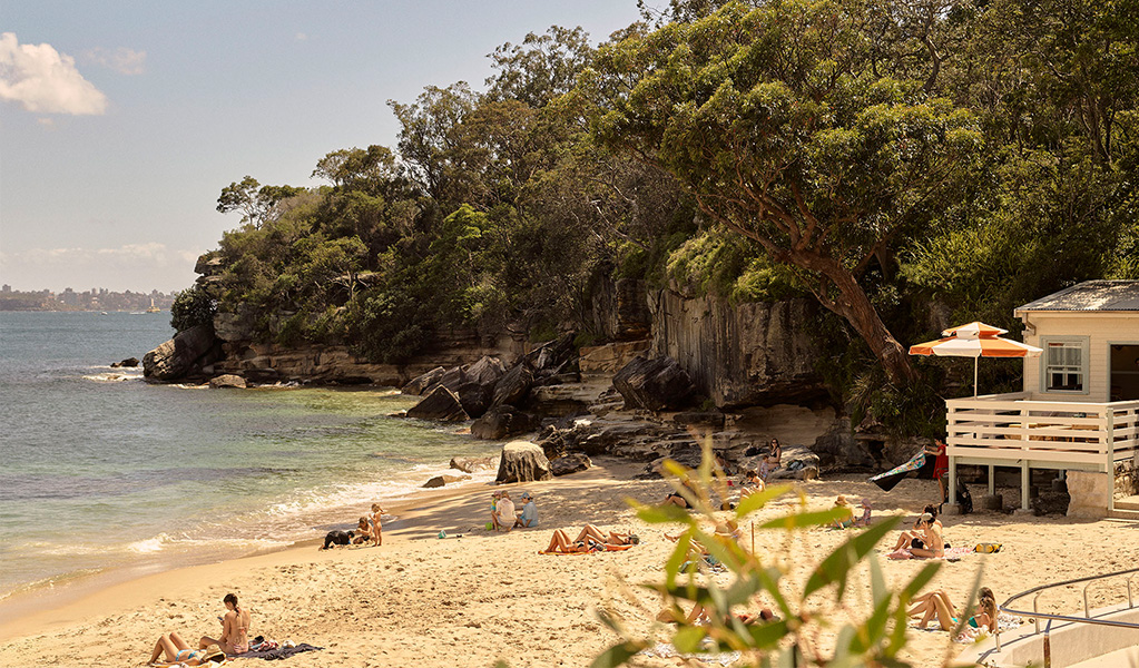 People sitting on the sand at Shark Beach in Nielsen Park, Sydney Harbour National Park. Credit &copy; Annie Saba