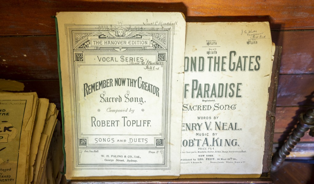 Hymn books in the parlour room of Craigmoor House in Hill End Historic Site. Photo: John Spencer &copy; DPE