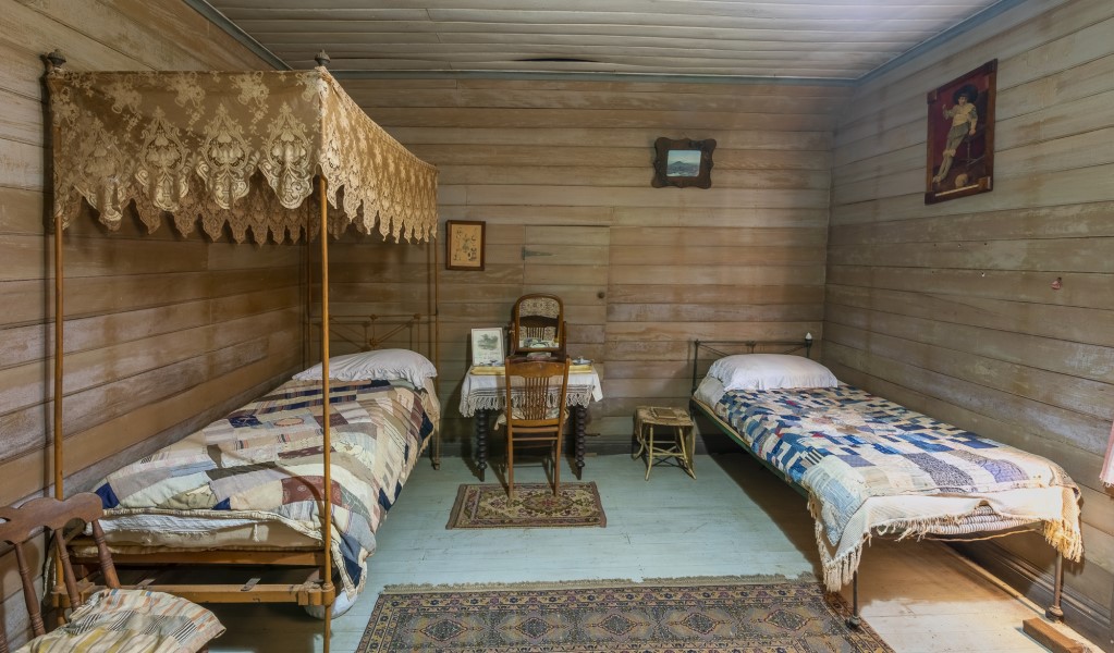 Two of the beds in the bedroom with the Juliet balcony at Craigmoor House. Photo: John Spencer &copy; DPE