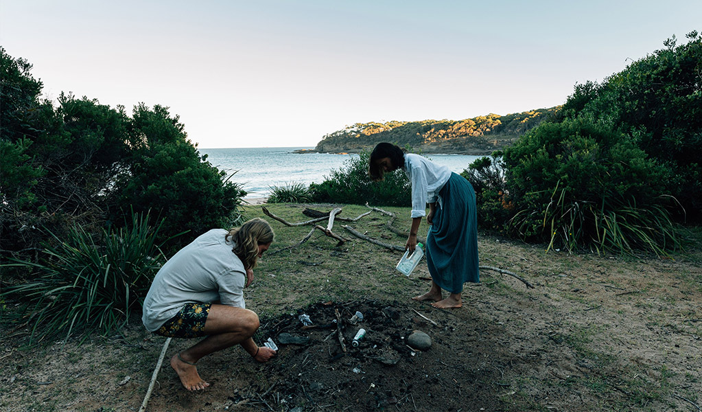 Campers picking up their rubbish, Murramarang National Park. Credit: Melissa Findley/DCCEEW &copy; Melissa Findley