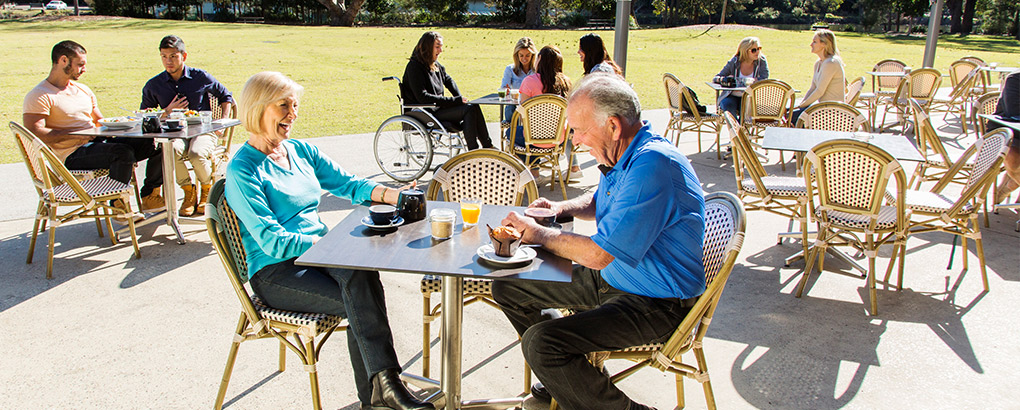 An older couple dine at Audley Cafe, Royal National Park. Photo: Simone Cottrell &copy; DPIE