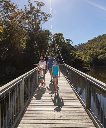 Family on Gibberagong track, Bobbin Head, Ku-ring-gai Chase National Park. Photo: David Finnegan &copy; DPIE