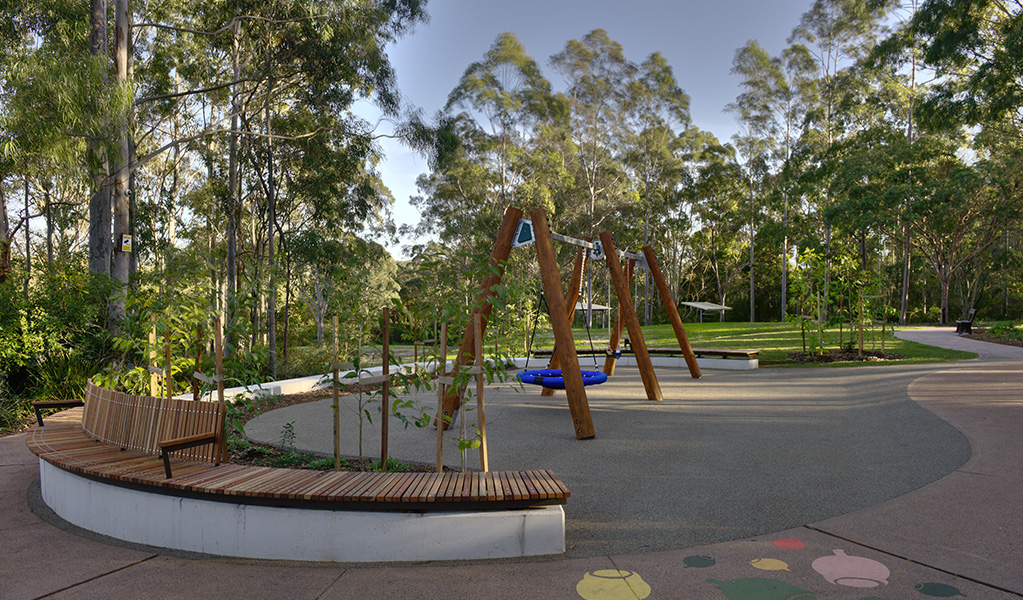 View of the playground, Village Green picnic area and playground, Blue Gum Hills Regional Park. Credit: Stuart Cohen, Bottle Brush Media © DCCEEW
