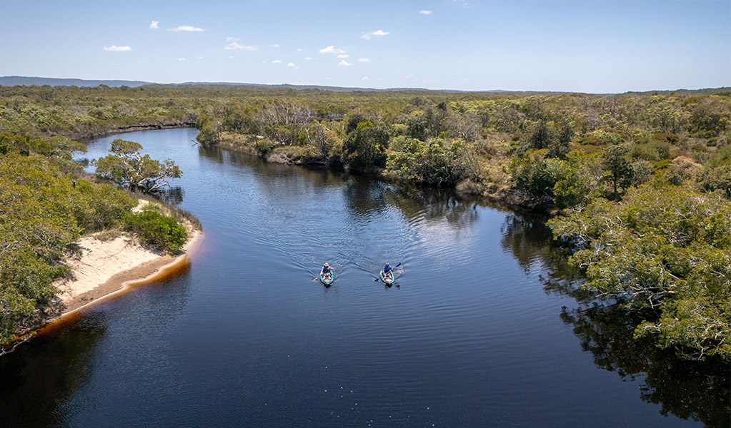 Two people kayaking along Jerusalem Creek paddle route. Credit: John Spencer &copy; DCCEEW