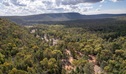 An aerial view of the trees and horizon of Ironbark picnic area in Cocoparra National Park. Credit: John Spencer &copy; DCCEEW