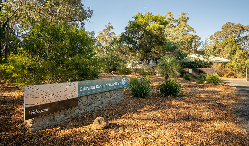 Park sign on entry to Mulligans campground. Photo: Robert John Spencer &copy; DCCEEW