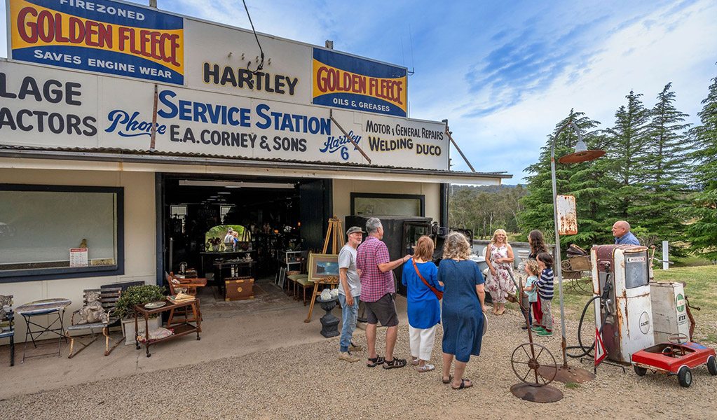 Visitors outside Gold Rush Antiques, Hartley Historic Site, near Lithgow. Credit: John Spencer &copy; DCCEEW