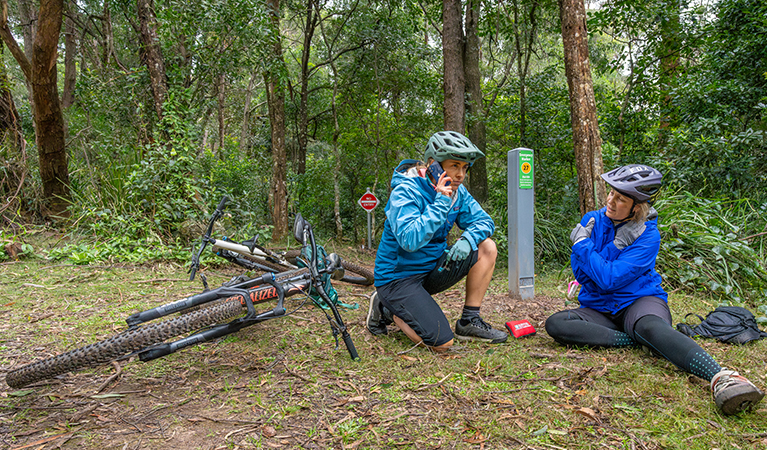 Two women call for help. The unique ID on the marker helps emergency services find them. Credit: John Spencer &copy; DCCEEW
