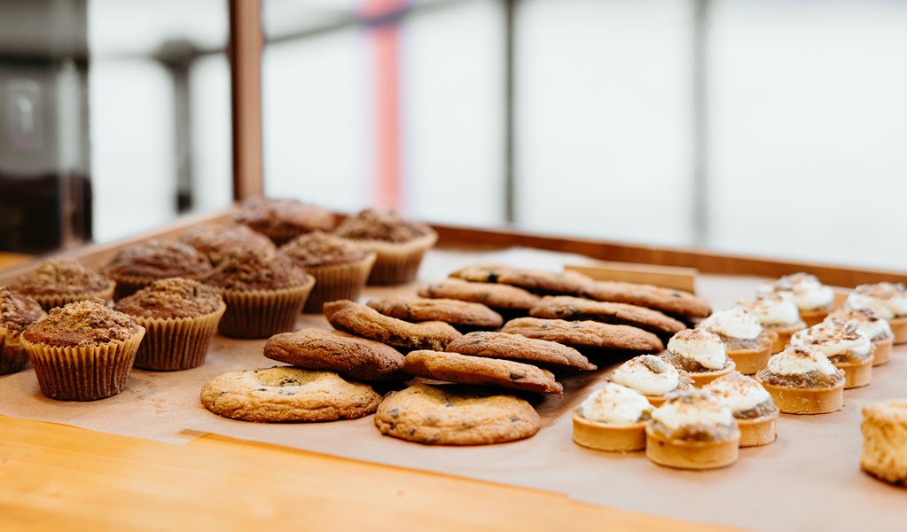 Some delicacies from The Burrow Cafe bakery, including muffins, chocolate chip biscuits and mini tarts, Morton National Park. Credit and &copy;: Lily Crouch
