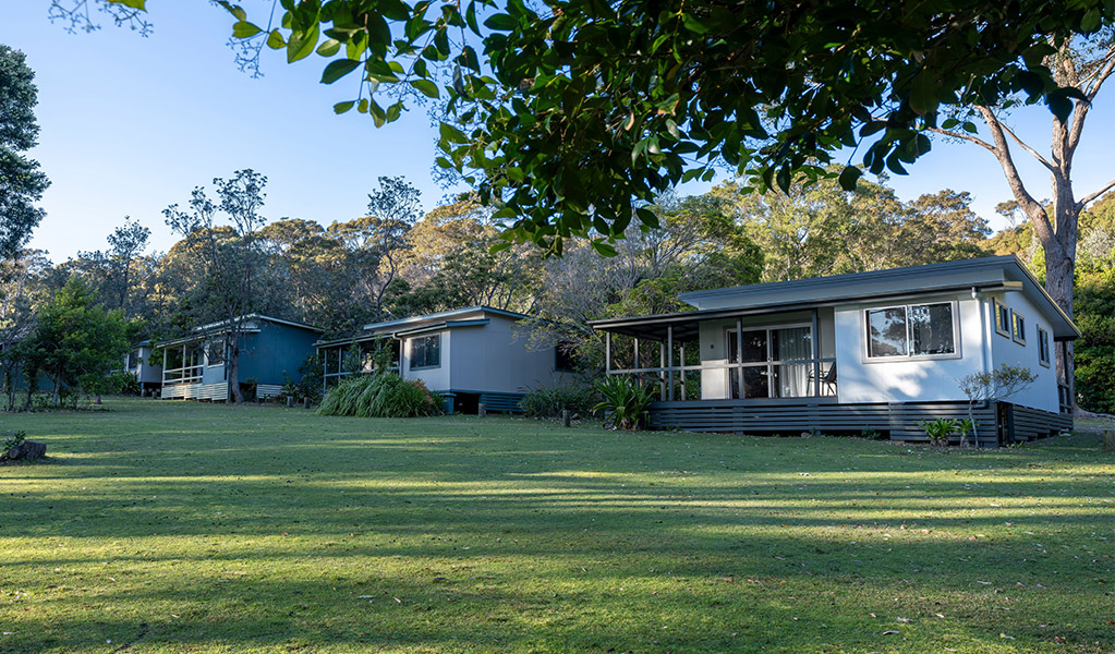 Exterior view of Depot Beach cabins. Photo: John Spencer &copy; DCCEEW