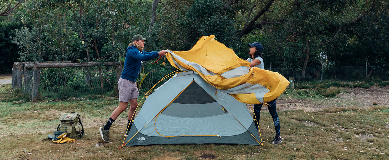 2 campers setting up their tent at Pretty Beach campground. Credit: Melissa Findley &copy; Melissa Findley