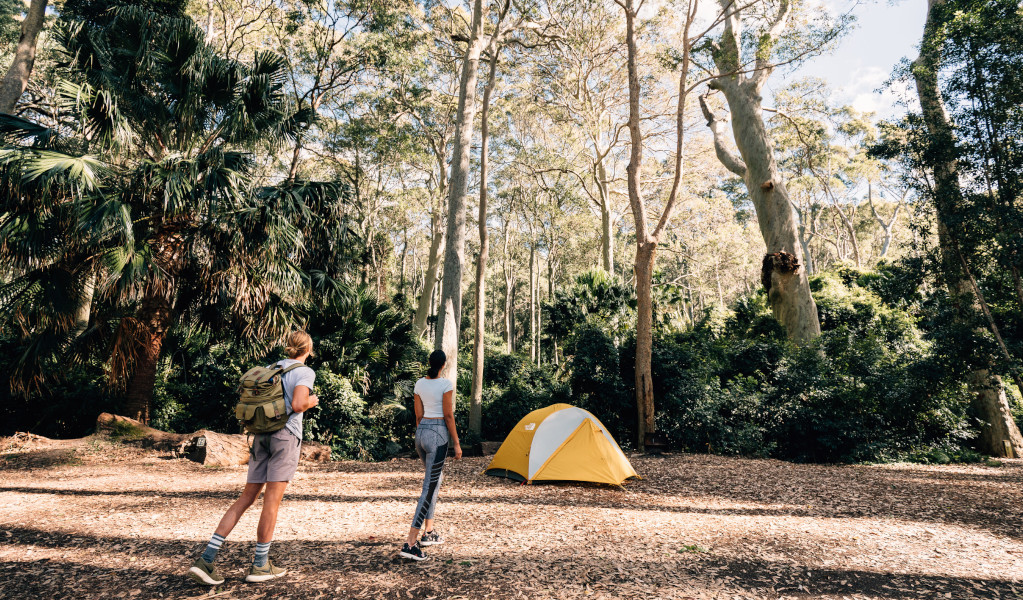 2 campers walking to their tent at Depot Beach campground. Credit: Melissa Findley &copy; Melissa Findley