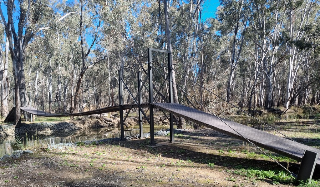 Pepes Bridge, a simple swing bridge in Murray Valley National Park. Credit: Amanda Hipwell &copy; DCCEEW